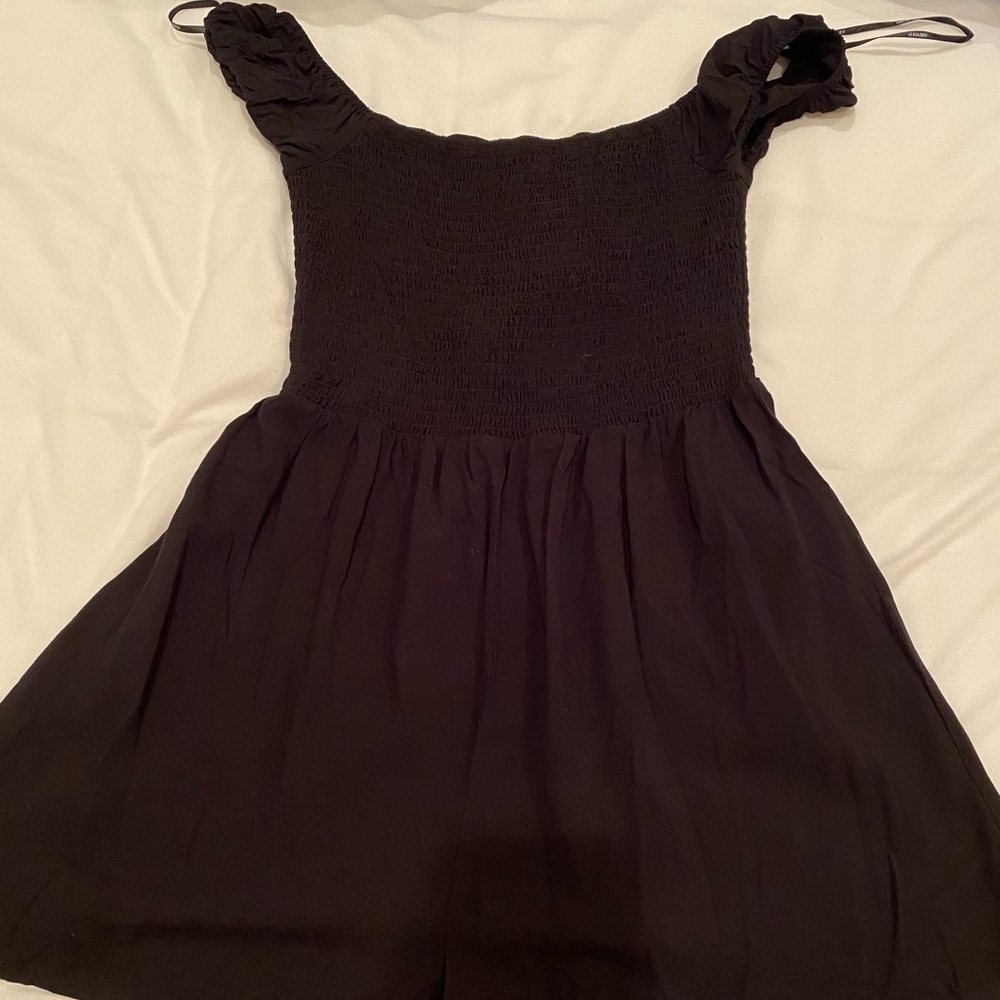 Black ruffle top/flowy bottom romper